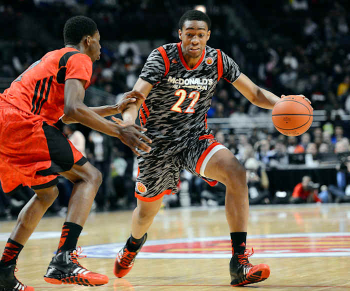 Apr 3, 2013; Chicago, IL, USA; McDonald's All American West forward Jabari Parker (22) dribbles the ball against McDonald's All American East forward Andrew Wiggins